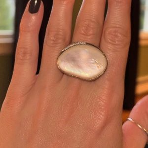 Ippolita sterling silver cocktail ring with milky white colored stone.
